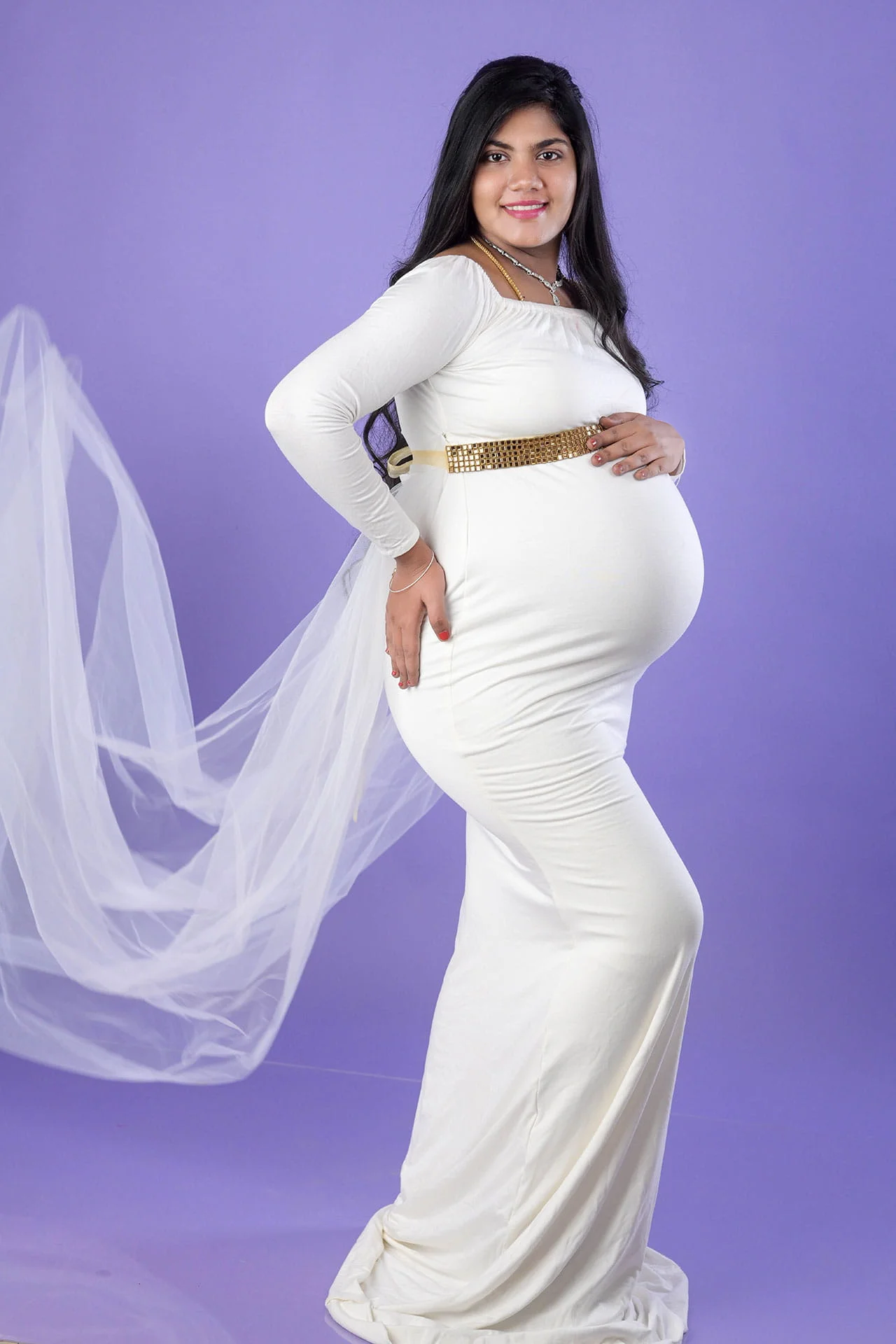 maternity in white gown