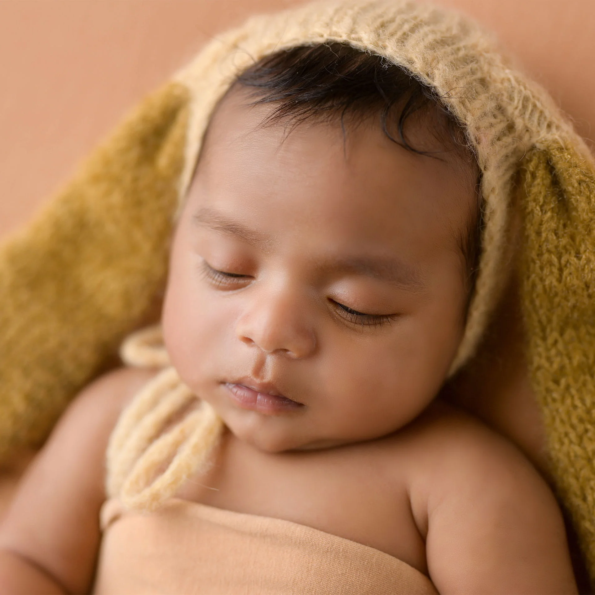 newborn in bunny cap