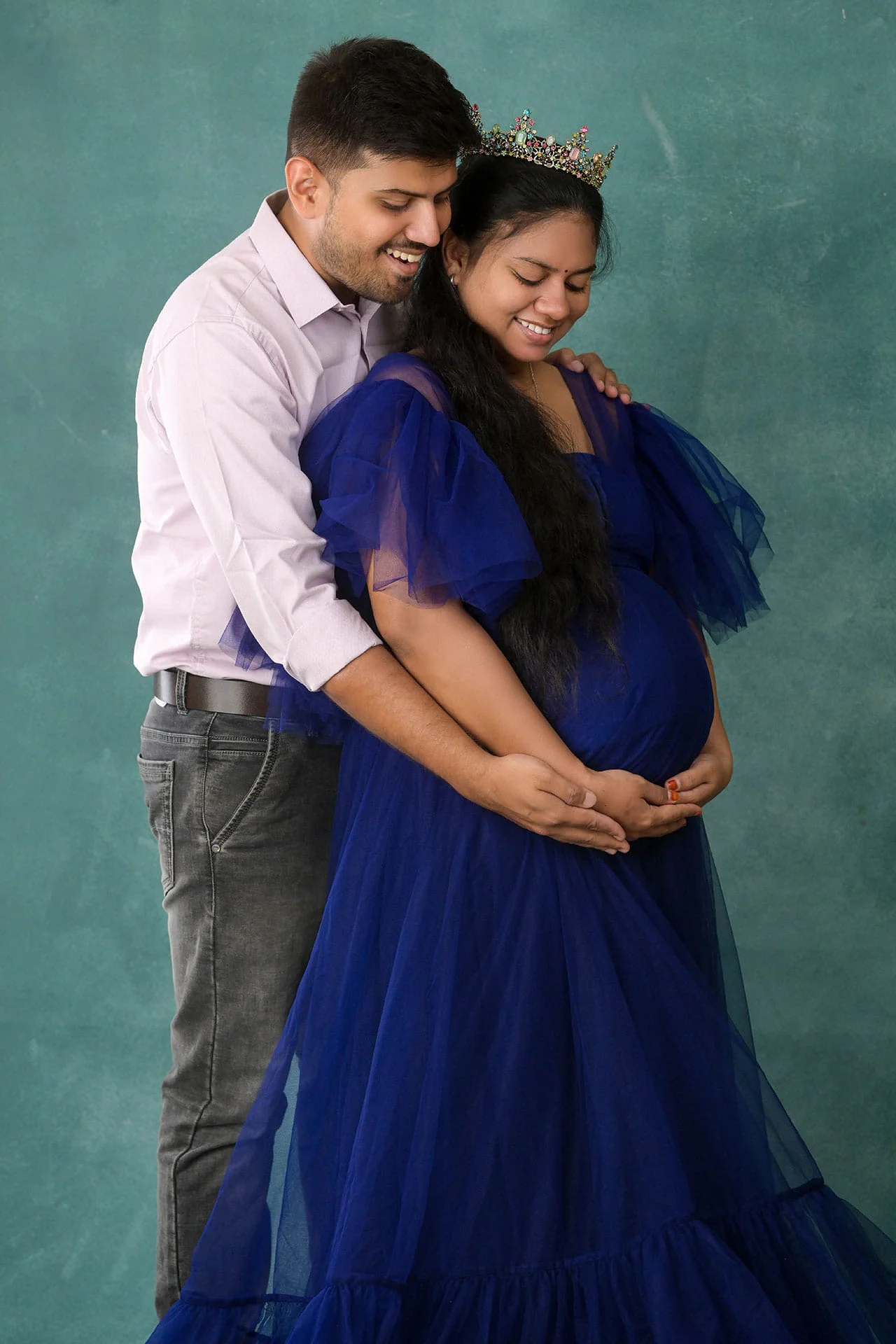 maternity photoshoot in blue gown