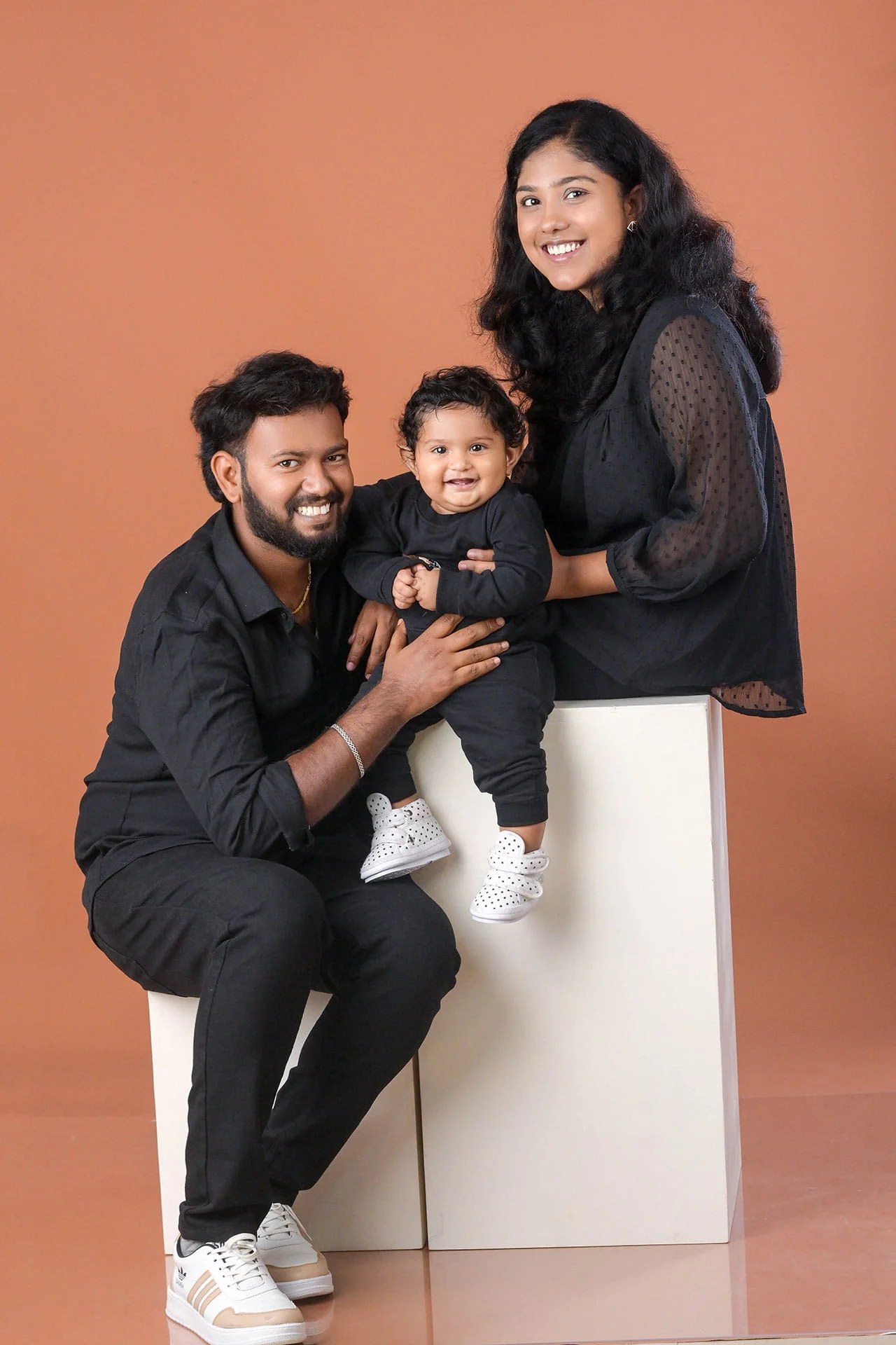 baby and family portrait