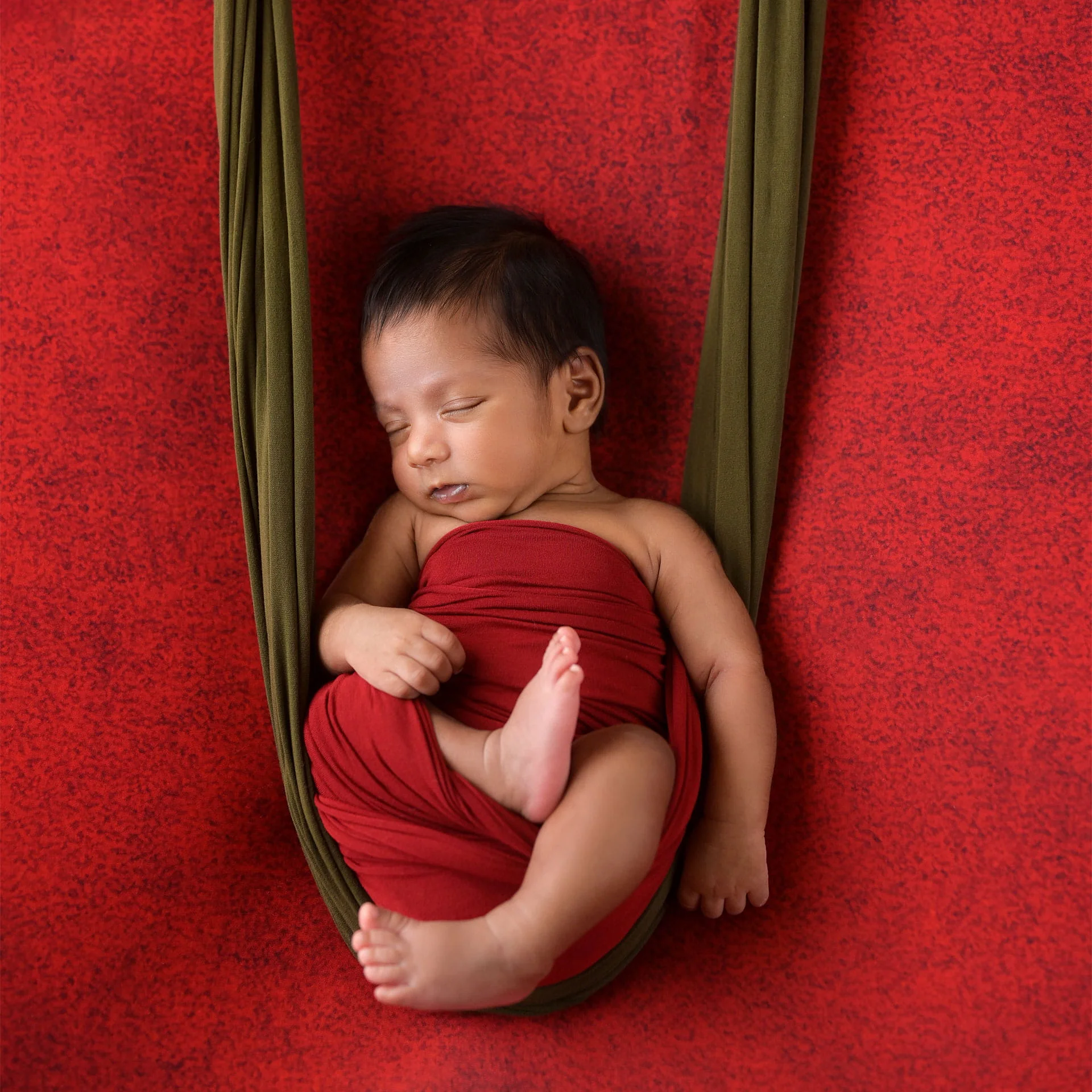 classic newborn portrait in red