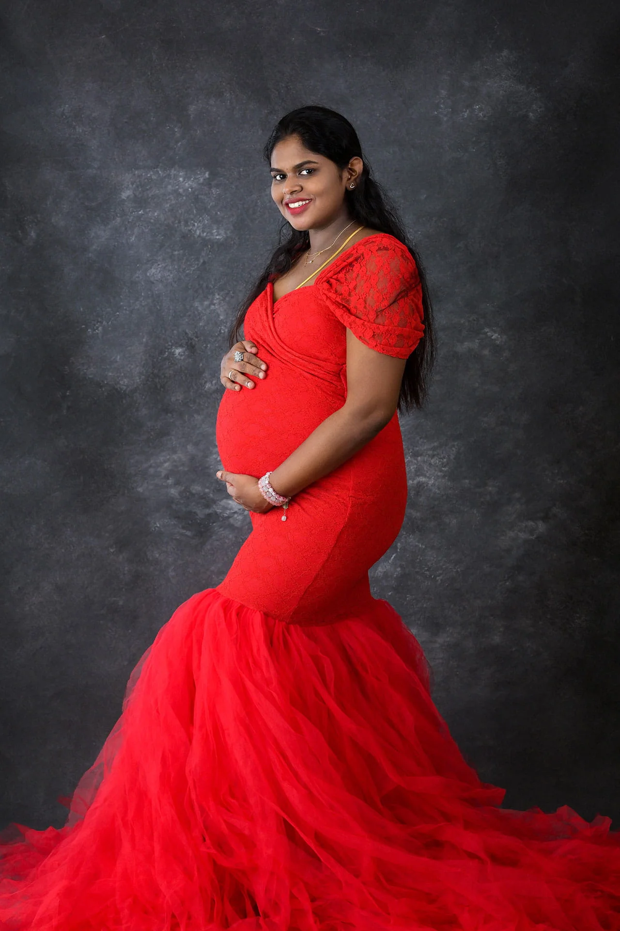 maternity in red gown