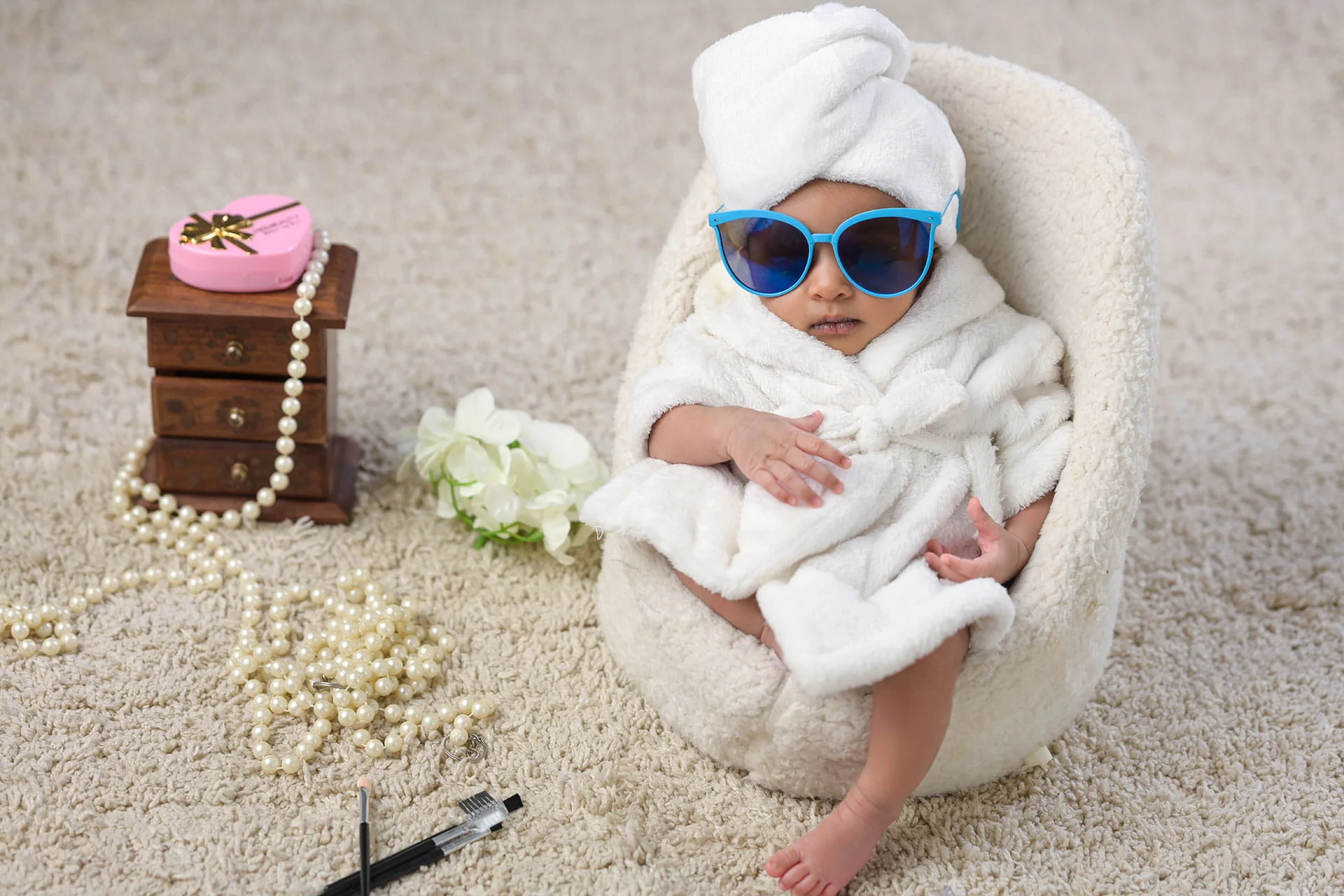 newborn in bath towel setup