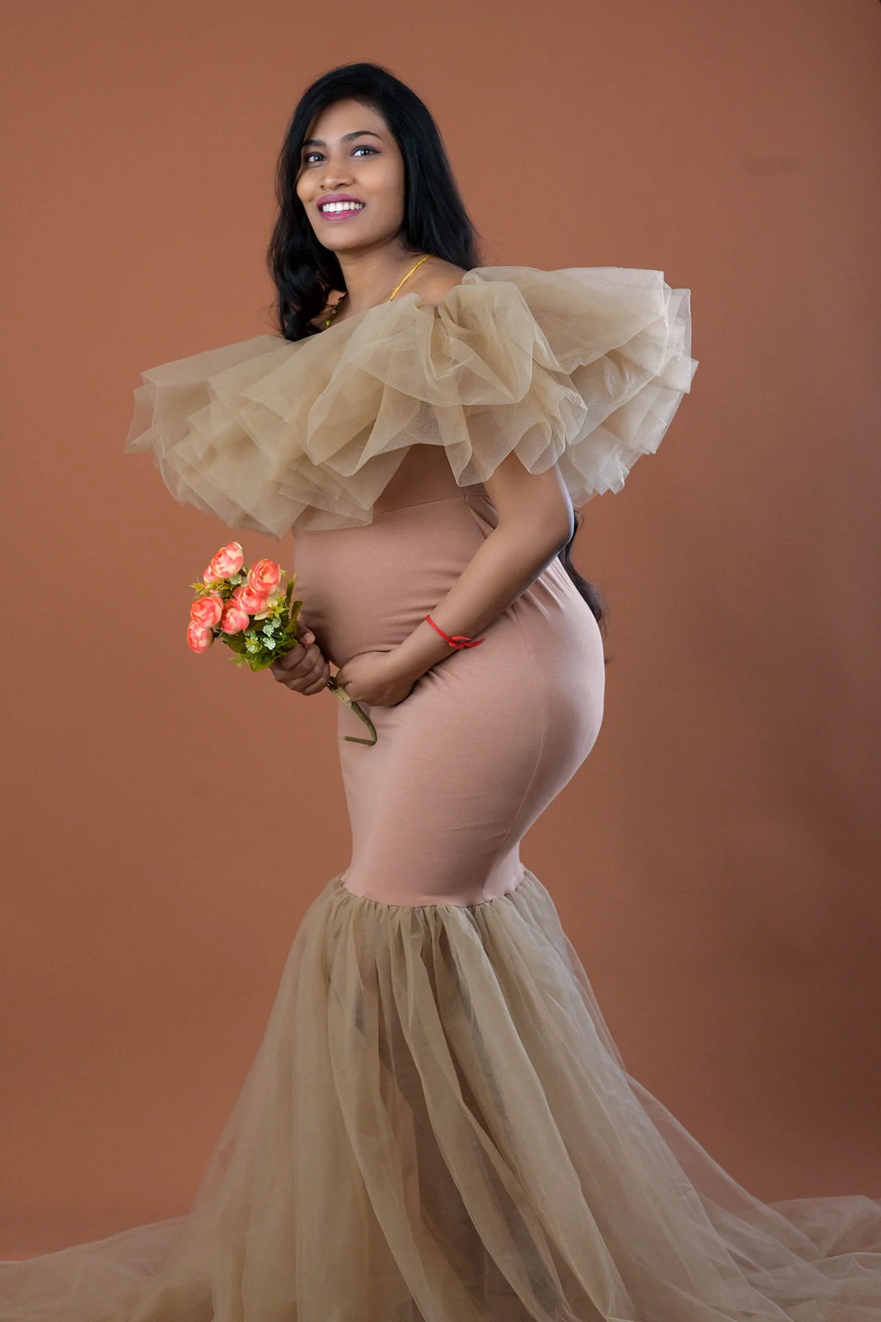 maternity gown in caramel